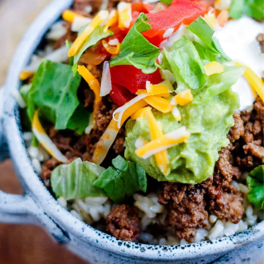 Burger bowl with beef lettuce and other ingredients.