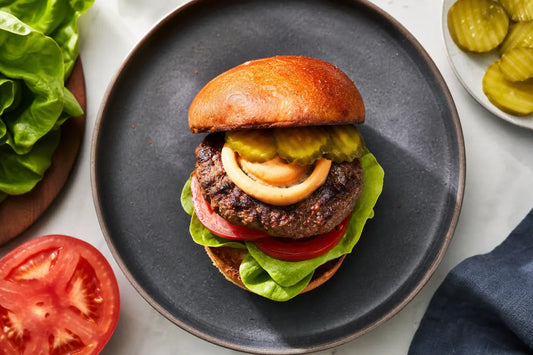 Healthy burger sauce on a homemade burger with fresh toppings