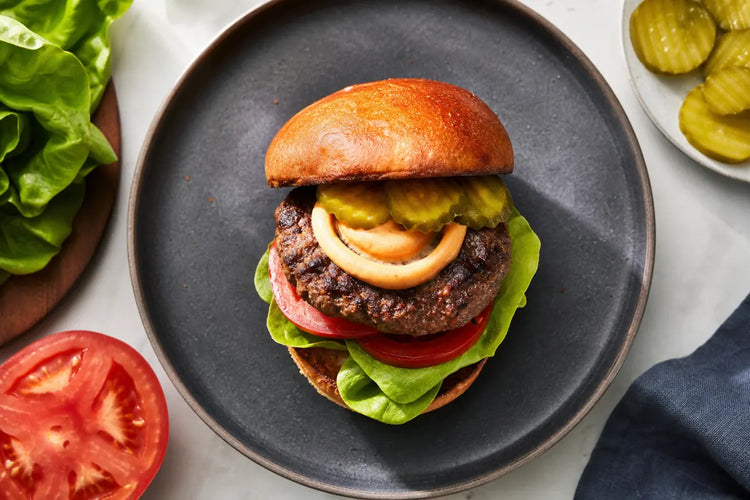 Healthy burger sauce on a homemade burger with fresh toppings