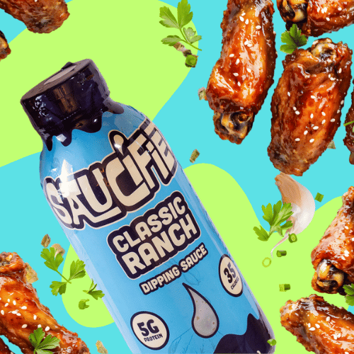 Saucified Classic Ranch dipping sauce bottle with chicken wings on a colorful background