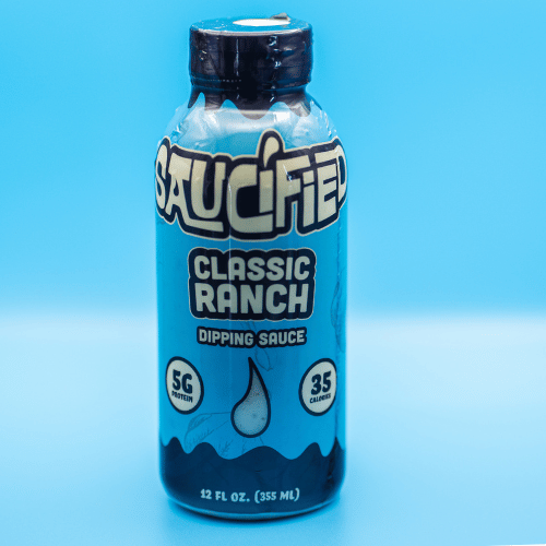 Bottle of Saucified Classic Ranch dipping sauce on a blue background