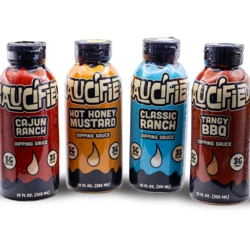 Four bottles of Saucified sauces on a white background